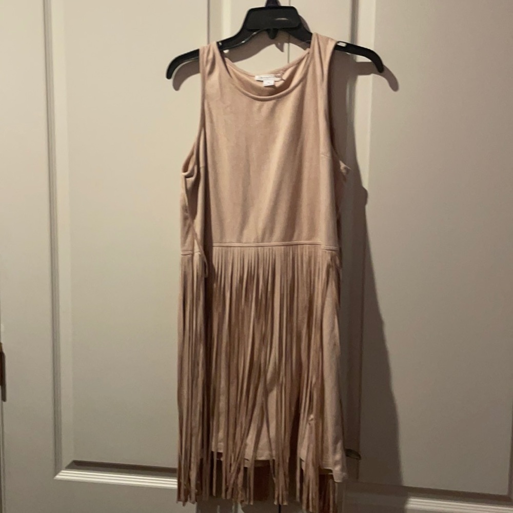 Light pint fringe dress